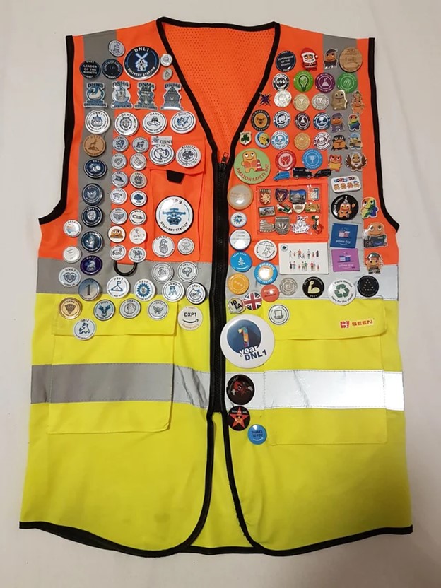 Work vests are great spots to add enamel pins.